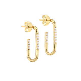 A pair of gold hoop earrings with small clear stones set along the front, shown on a light gray gradient background.