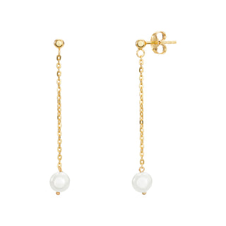 Gold chain earrings with pearl drops on a white background