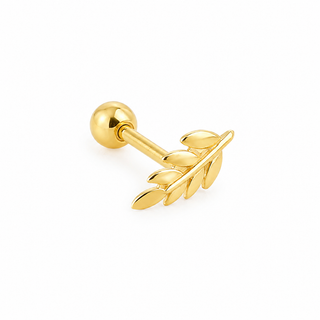 A gold-colored labret stud earring featuring a leafy branch design on the front, shown against a plain white background.