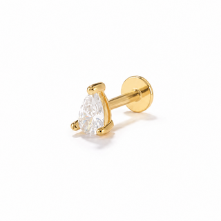 A single gold stud earring featuring a pear-cut clear gemstone in a prong setting, shown on a clean white background.