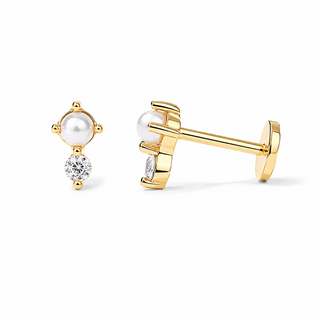 A pair of gold stud earrings with a white pearl and a clear round-cut gemstone, shown on a clean white background. One earring is shown from the front, and the other is shown from the side to display the post and backing.