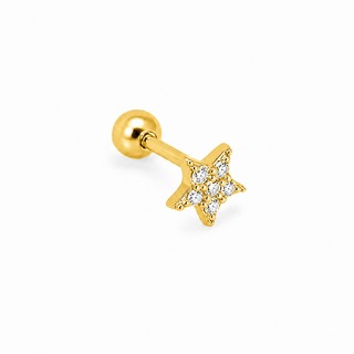 A gold star-shaped labret stud earring with a cluster of clear cubic zirconia stones on the star, shown on a clean white background.
