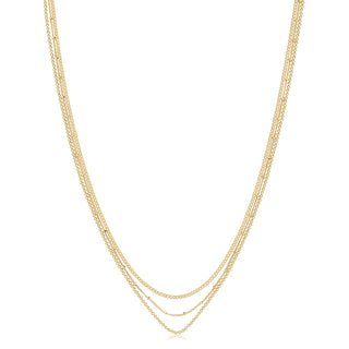 Gold chain necklace on a white background