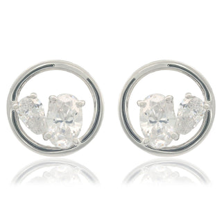 Pair of silver earrings with clear gemstones on a white background