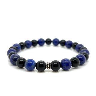 Beaded bracelet with lapis lazuli and black beads on a white background