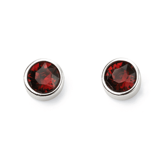 A pair of silver stud earrings with red crystal embellishments.