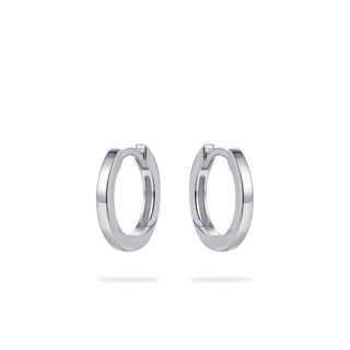 Pair of silver hoop earrings on a white background
