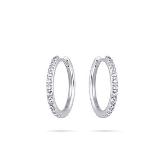 Pair of silver hoop earrings with small cubic zirconias on a white background