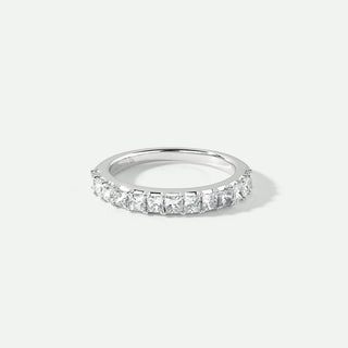 white gold etenrity ring with diamonds on a white background