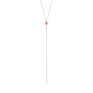Long necklace with a rose ball pendant on a white background