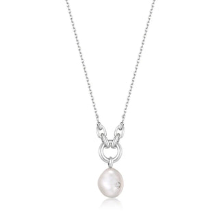 Pearl necklace with a silver chain on a white background