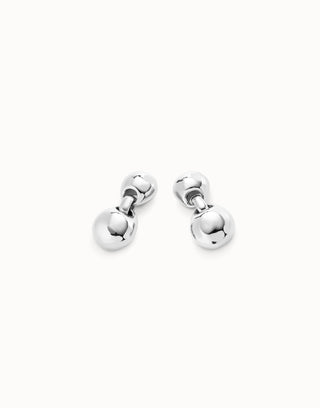 Pair of silver ball earrings on a white background
