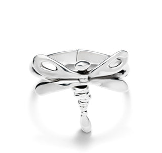 A sterling silver-plated rigid bracelet featuring a large dragonfly design, with a reflective surface.