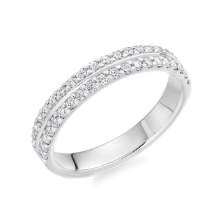 Silver ring with embedded diamonds on a white background