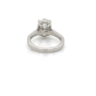 Platinum ring with a diamond on a white background