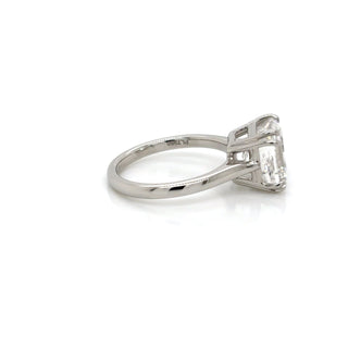Diamond ring with a white gemstone on a white background
