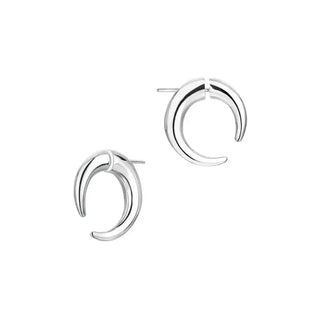 Silver crescent-shaped earrings on a white background
