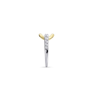 Gold and silver ring with small diamonds on a white background