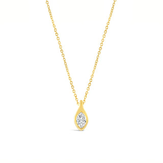 Gold necklace with a teardrop-shaped diamond pendant on a white background