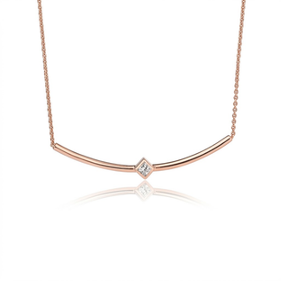 Rose gold curved bar necklace with a square white topaz stone in the centre