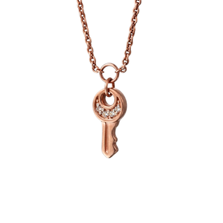 Rose gold key-shaped pendant necklace on a white background