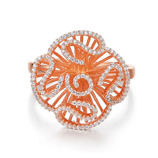 Ornate rose gold ring with intricate design and sparkling stones on a white background