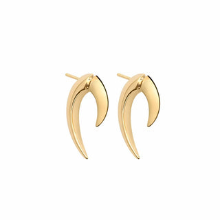 Gold horn-shaped earrings on a white background