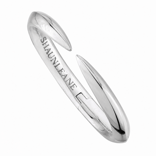Silver cuff bangle with 'Shaun Leane' branding on a white background