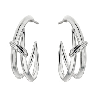Pair of silver hoop earrings on a white background