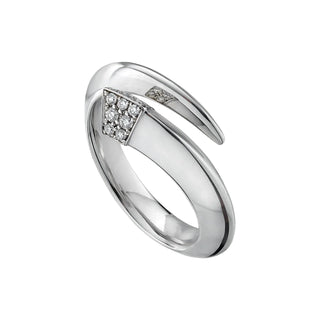 Silver ring with diamond accents on a light gray background