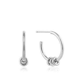 Silver hoop earrings on a white background
