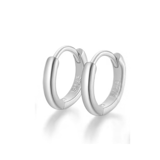 Pair of silver hoop earrings on a white background
