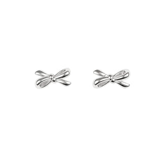 A pair of silver bow-shaped stud earrings on a plain white background.