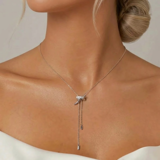Necklace with a pendant on a model against a neutral background