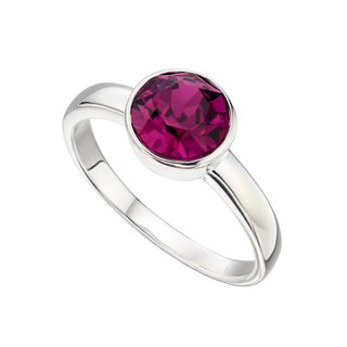 Silver ring with a pink gemstone on a white background