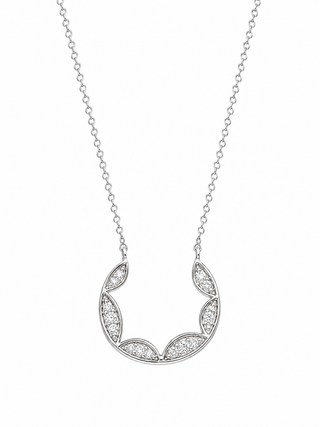 Silver necklace with a crescent moon pendant on a white background