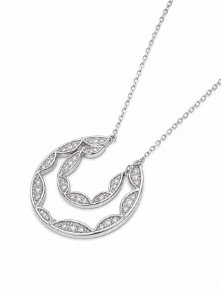 Silver necklace with a hoop-shaped pendant on a white background