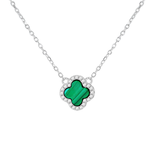 Necklace with a green clover-shaped pendant on a white background