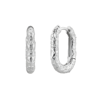 a pair of silver textured rectangular shaped hoop earrings on a white background