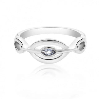 Silver ring with a central gemstone on a white background