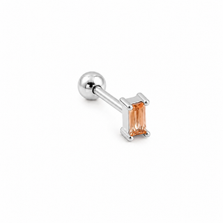A silver-toned labret piercing stud featuring a rectangular peach-colored gemstone in a prong setting, shown on a clean white background.