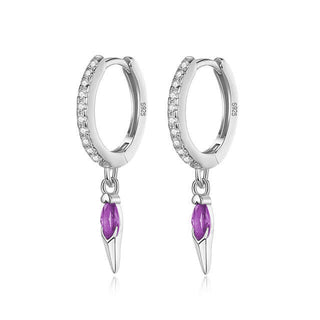 A pair of purple cubic zirconia spike drop huggies.
