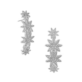 A pair of silver bar drop earrings with four star-shaped settings, each pavé set with a sparkling cubic zirconia.