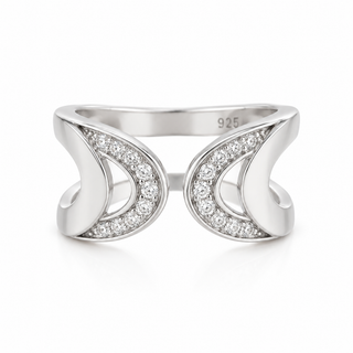Silver ring with diamond accents on a white background