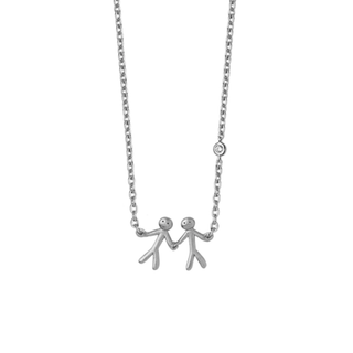 Silver necklace with two small figures holding hands on a white background