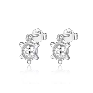 Silver turtle-shaped earrings on a white background
