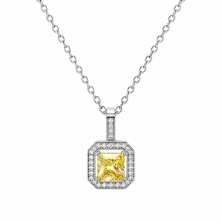 A silver-toned necklace with a square pendant featuring a yellow center stone surrounded by a halo of small clear stones, shown on a plain white background.