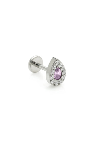 Silver earring with a purple gemstone on a white background