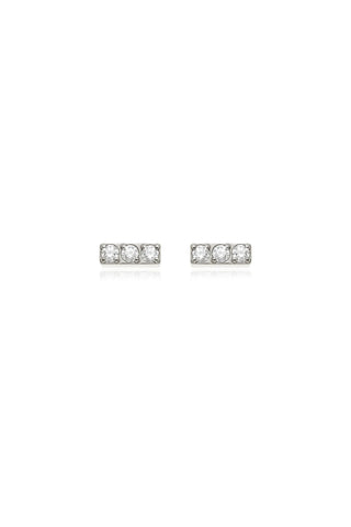 Pair of silver earrings with clear stones on a white background