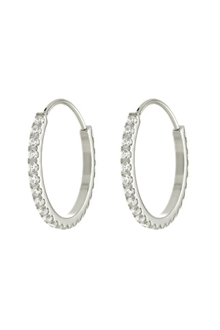 Silver hoop earrings with clear stones on a white background